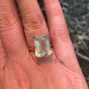Worn once costume ring size 7.5 and gold